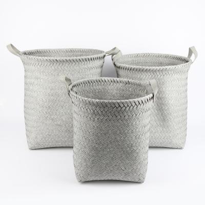 China 3pcs/set Sustainable Natural Imitated Rattan Woven Storage Basket Clothes Toys Storage Basket With PU Handle for sale