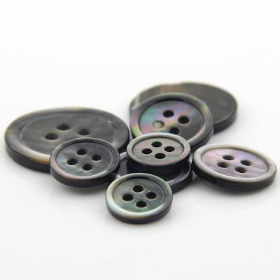 China Sustainable Hot Sale Garment Button Types Natural Shell Material 4 Holes Pearlescent Shirt Buttons for sale