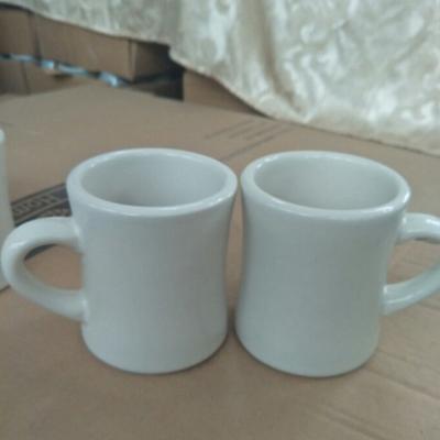 China Classic Creamy White Diner Stocked Mugs For Coffee With 11oz Capacity for sale