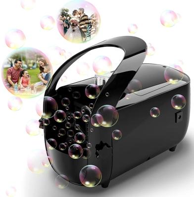 China Kids Party/Weeding/Pets/Toys Plug-in or Battery Powered Professional Bubble Machine Automatic Portable Bubble Maker for sale