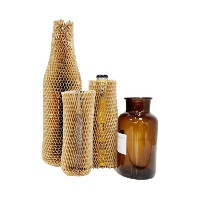 China Eco-friendly Biodegradable Recyclable Honeycomb Paper Shockproof Cylindrical Sleeve For Fragile Goods Wine Bottle for sale