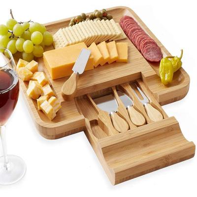 China Drawer Set Stocked Cutting Square Round Bamboo Acacia Foot Slate Cheese Board With Knife for sale