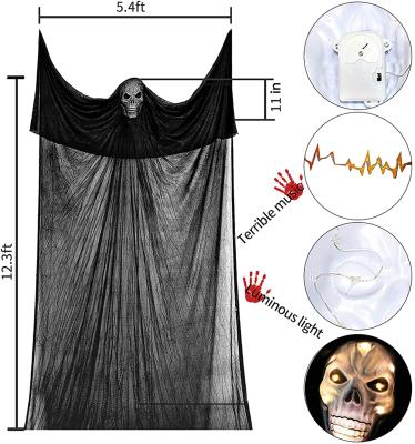 China Voice Activated Horror Halloween House Decorations 3.8cm Halloween Ghost Decor Reaper Hanging Motion With Noise And Glow Creepy Mask Haunted House for sale