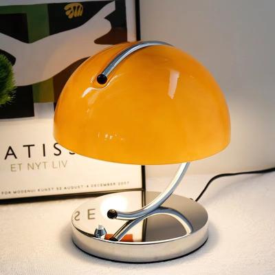 China EUROPEAN Popular Modern Style Retro Space Style Bedroom Bedside Designer Orange Desk Lamp for sale