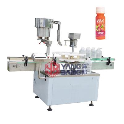 China Food Juice Bottles Capping Machine Automatic Screw Capping Machine Automatic Capping Glass Bottles And Plastic Bottles for sale