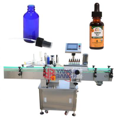 China Automatic Food Spray Perfume Bottle Labeling Machine Serum Oil Labeling And 2oz 30ml Packing Machine for sale