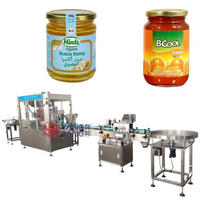 China Beverage Peanut Butter Filling Machine Glass Bottle Filling Machine Honey Jar Filling Machine 350g 500g 1kg for sale