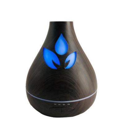 China Hotel Aromatherapy Humidifier Plant Success Ultrasonic Aroma Diffuser530ml Wood Grain 2021 Mini Humidifier for sale