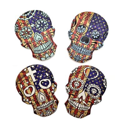 China Custom Ceramic Coasters Skull Viable Shape Ceramic Coaster Ceramic Coffee Coaster for sale