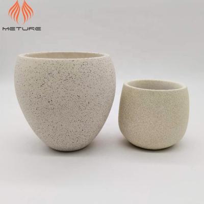 China Eco - Friendly Rounded Terrazzo Flower Pot White Bottom Cement Custom Planters for sale