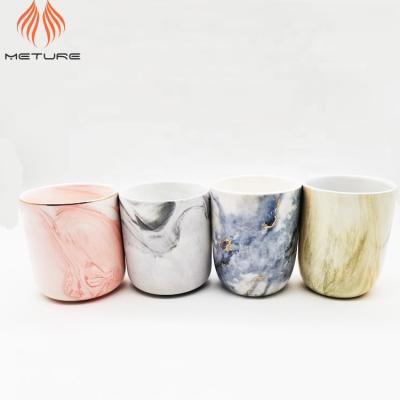 China Water proof; Heat resistant; Corrosion Ceramic Fragrance Oil Marble Effect Combination Clay Candle Resist Jar With Gold Top Rim for sale