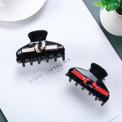 China Black Knotted Stylish Large Hair CIA Hairpin Eco-friendly Korean Hairpin Acetate Claw Ladies Clips for sale