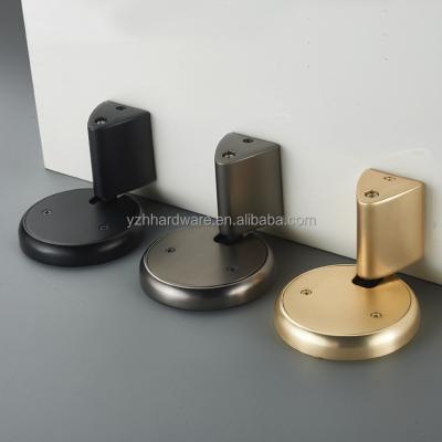 China Easy Installation Zinc alloy new design non perforated anti-collision and windproof door stopper for home door for sale