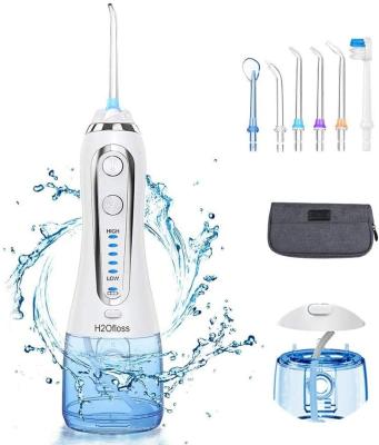 China IPX7 Waterproof Dental Water Flosser 5 Nozzles Electric Portable Oral Irrigator h2ofloss OEM for sale