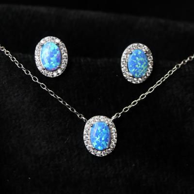 China CLASSIC Customized Oval Blue Japanese Opal Jewelry Rhodium Plated Cubic Zirconia Earrings Necklace 925 Sterling Silver Jewelry Sets for sale