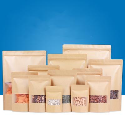 China Self-supporting kraft paper bag self sealing bag recyclable frosted windowed dry fruit food bag for sale