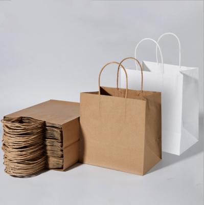 China Recycled Materials Custom Printed Your Own Logo Cardboard Packaging White Brown Kraft Paper Gift Craft Shopping Paper Bag With Handles for sale