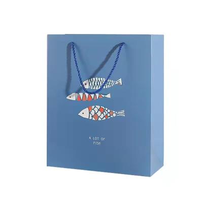 China High Quality Custom Recycled Materials Paper Gift Bags With Logo Design Luxury Packaging Bags for sale