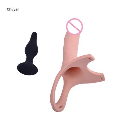 China Wearable Soft Silicone Hollow Penis Sleeve Enlarger For Gay Realistic Sex Toy Strap On Hollow Dildo Women Dildo Belt Men for sale