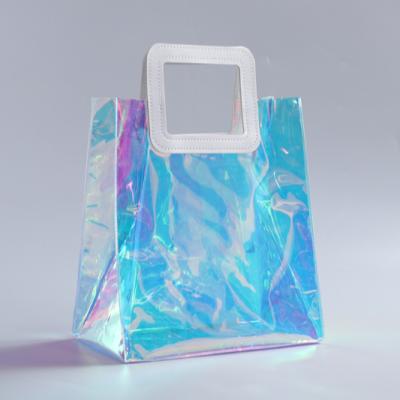 China Reusable Transparent Holographic Cosmetic Bag PVC Clear Shopping Bag With Handle Waterproof Beach Bag for sale