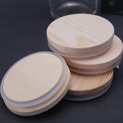 China Eco-Friendly Compostable Biodegradable Reusable Bamboo Jar Lids With Detachable Silicone Ring For Regular Mouth Mason Jar for sale