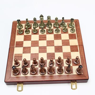 China Easy to Fold and Carry Standard Chess Set Classic Handmade Metal Wooden Chessboard Pieces International Folding Chess Set for Adult Children for sale