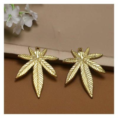 China FASHIONABLE jewelry accessories guojie DIY hemp leaf maple leaf exquisite pendant for jewelry making for sale