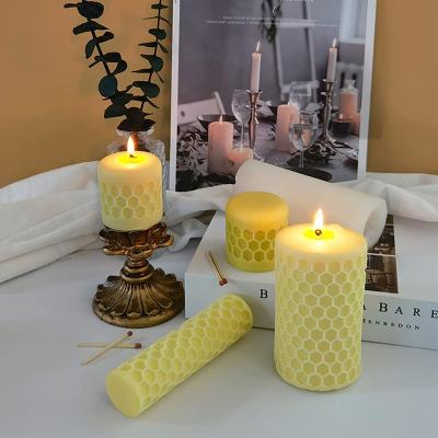 China Disposable Geometric Cube Molds 3D Cylinder Bee Honeycomb Designer Candle Molds Silicone For Candle Making for sale