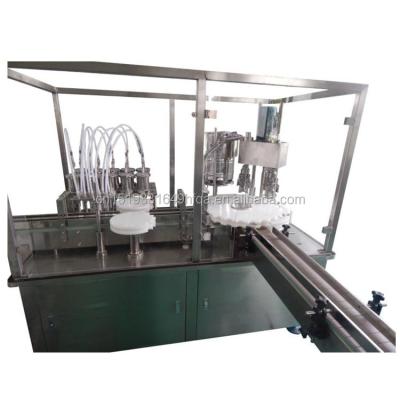 China Hot Sale Food Small Bottle Filling Machine Bottle Filling Machine Bottle Covering And Filling Machine Multifunctional Design 2022 New for sale