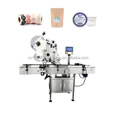 China Food bag labeling machine plastic boxes multifunctional labeling machine flat surface automatic top labeler for sale