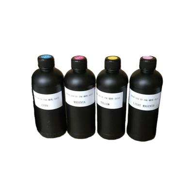 China TX800/XP600 Tinta CMYK compatible para impresora de piso plano UV Desaparece incluida Impresión digital en venta