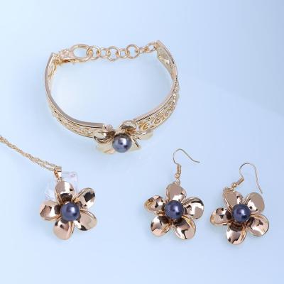 China Retro TRENDY Hawaiian style flower jewelry set earrings necklace bracelet gold plated set for women Yiwu junjian for sale