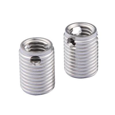 China Heavy Industry 308 Hole Type Inner And Outer Teeth Stainless Steel Nut Locking Tapping Screw Sleeve for sale