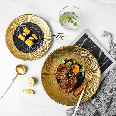 China High Quality Black Ceramic Steak Dishes Porcelain Restaurant Dinnerware Dishes Stocked Stone Sets With Gold Rim for sale