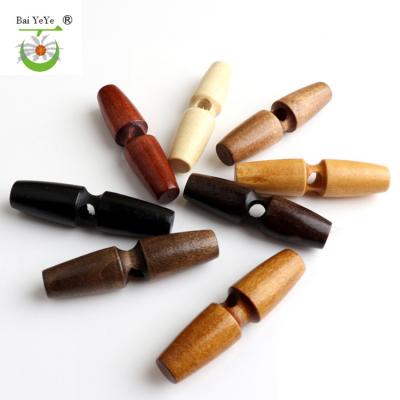 China Viable Factory Custom Wooden Vintage Up Buttons For Women Garment Sweater Jacket Oval Shape With Holes Natural Wood Buttons For Clothes for sale