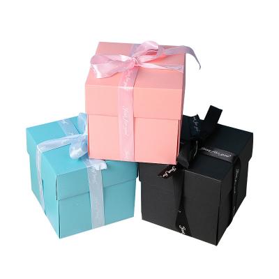 China Recycled Materials In Valentine's Day Running Black Birthday Factory Explosion Box Album Surprise Foldable Paper Box for sale