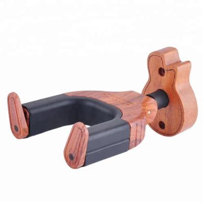 China 2018 Newest Fashionable Guitar Hanger Pedestal Wooden Guitar Shaped Guitar Hanger for sale