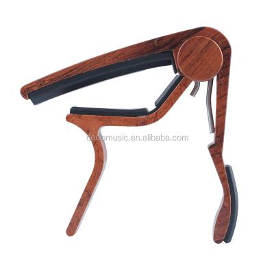 China Unique MA-12 GUITAR Punk Music Design Mounted Wood Paint Quality High End Guitar Capo for sale