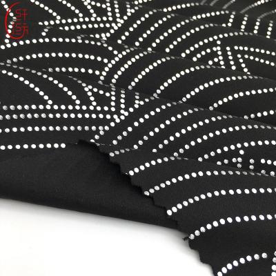 China Shrink-resistant knitting 100%Polyester fabric with silver foil dot design for fashion garment for sale