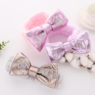 China Popular MY OH GOD Letters Wholesale Women Headband Plush Face Headband Coral Fleece Bow Spa Headband Rabbit Ear Hair Wash Accessory for sale