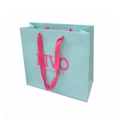 China Recyclable Custom Luxury Clothing Cosmetic Logo And Size Wholesale Packaging Paper Shopping Bags for sale