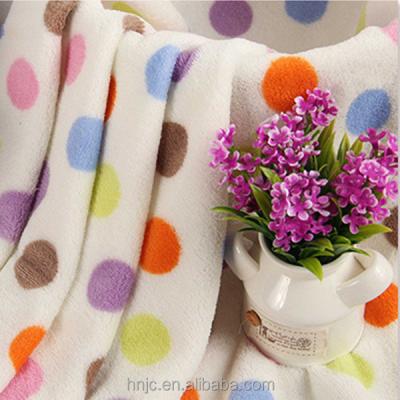 China Coral Color Single Spots Polyester Fleece Fabric For Pajamas And Fabric Soft Hand Feel for sale