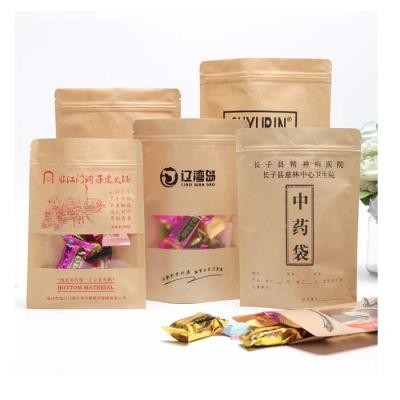 China Recycled Materials Wholesale Stand Up Kraft Paper Food Packaging Bags With Window for sale