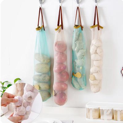 China New Sustainable Mesh Net Breathable Fruit Vegetable Garlic Onion Hanging Storage Bag Kitchen for sale