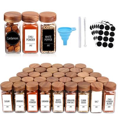 China Airtight lid 12/24 Pieces Set 120ml Small Transparent Aluminum Bamboo Wooden Lid Kitchen Spice Sorting Glass Jars With Name Tag Sticker for sale