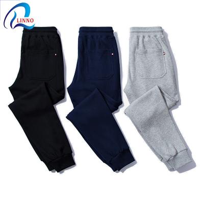 China wholesale hot sale custom logo 100 cotton sweatpants men's gym sweatpants anti-wrinkle running track drawstring pants for adult for sale