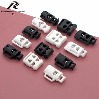 China Nickel Free Double Hole Plastic Rope Lock Stopper With Side-hole For Backpacks for sale