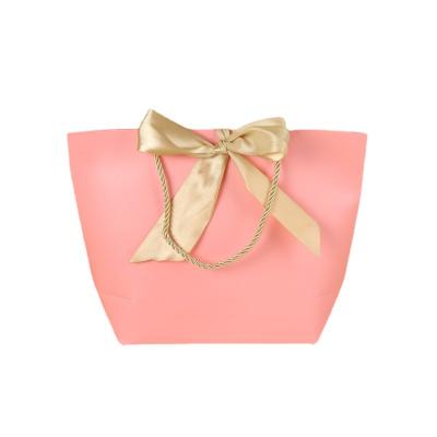 China Chinese Style Recyclable Custom Pink Fashion Clothing Shoes Jewelry Paper Shopping Paper Bag With Ribbon Paper Bag for sale