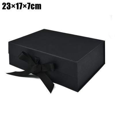 China Recyclable Personalized Luxury Logo Black Magnet Closure Folding Hard Packaging Gift Box With Ribbon for sale