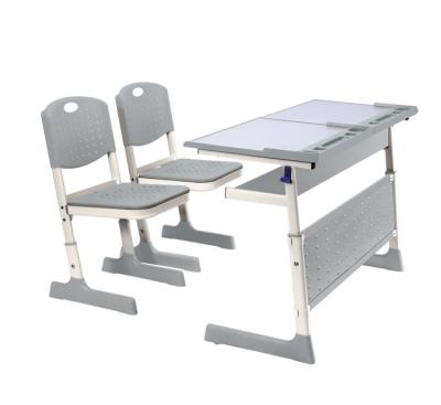 China Simple modern bachelor school furniture student table and chair modern, children learning table and chair for sale